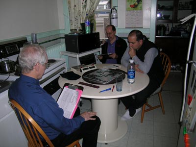 [photo of players in John's kitchen]